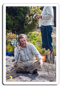 Man in the bush on satellite phone